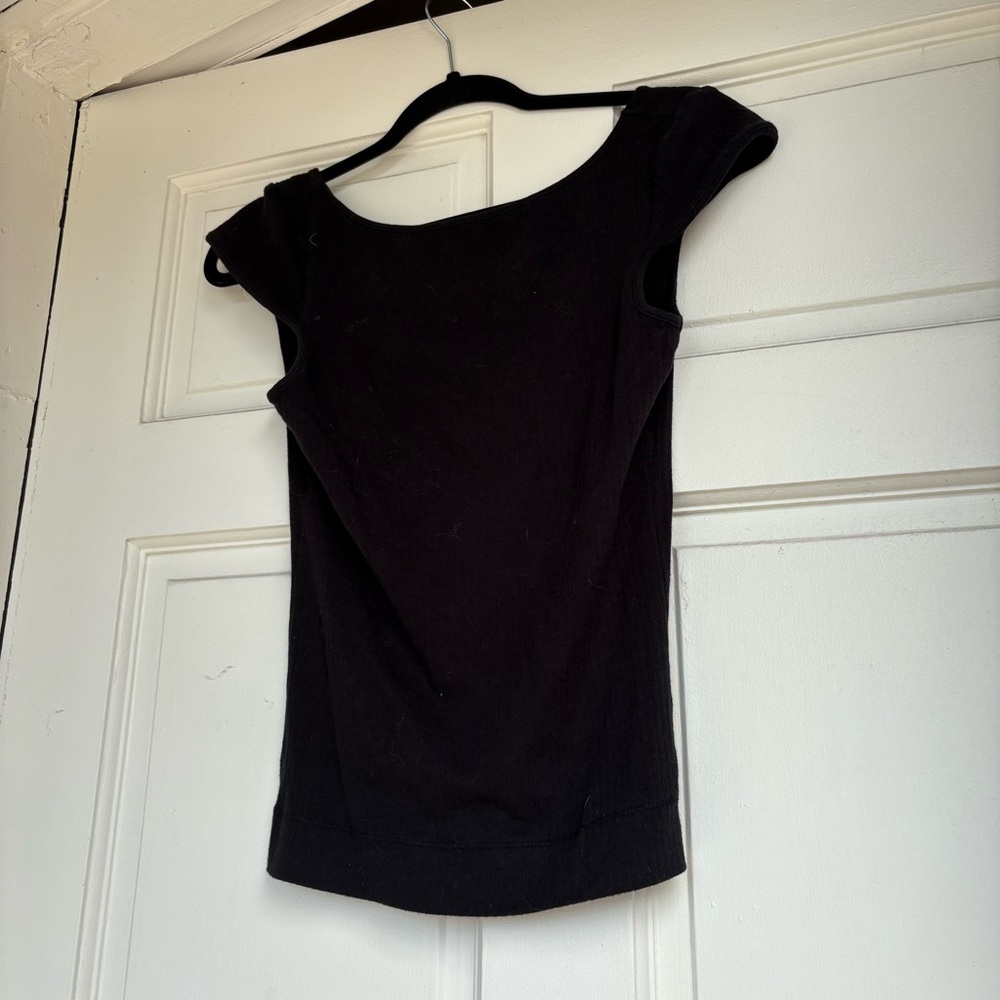 Free people intimately clean lines off should  low scoops back Black top . SMB